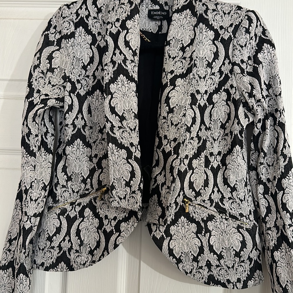Bebe black and white fitted blazer type cropped jacket, gold accents